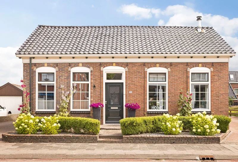 Vrijstaande jaren 20 woning | Kunststof kozijnen met roeden